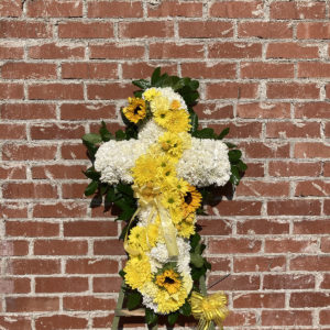 Cross with yellow floral down center