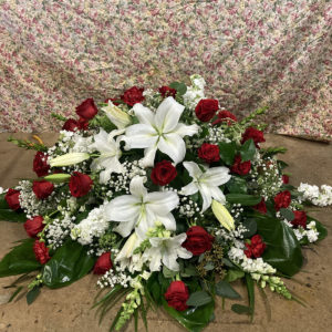 Red and white casket spray